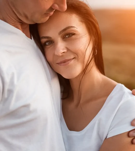 Happy adult couple in countryside